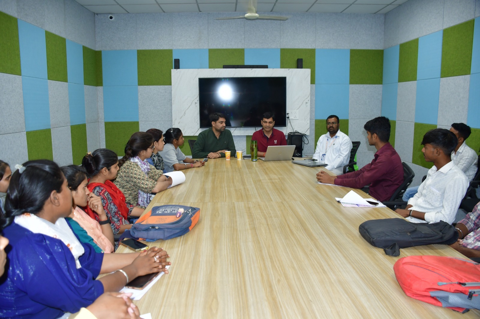  The management at an ApniPathshala learning pod interacting with their students showing the importance of a balanced teaching approach.