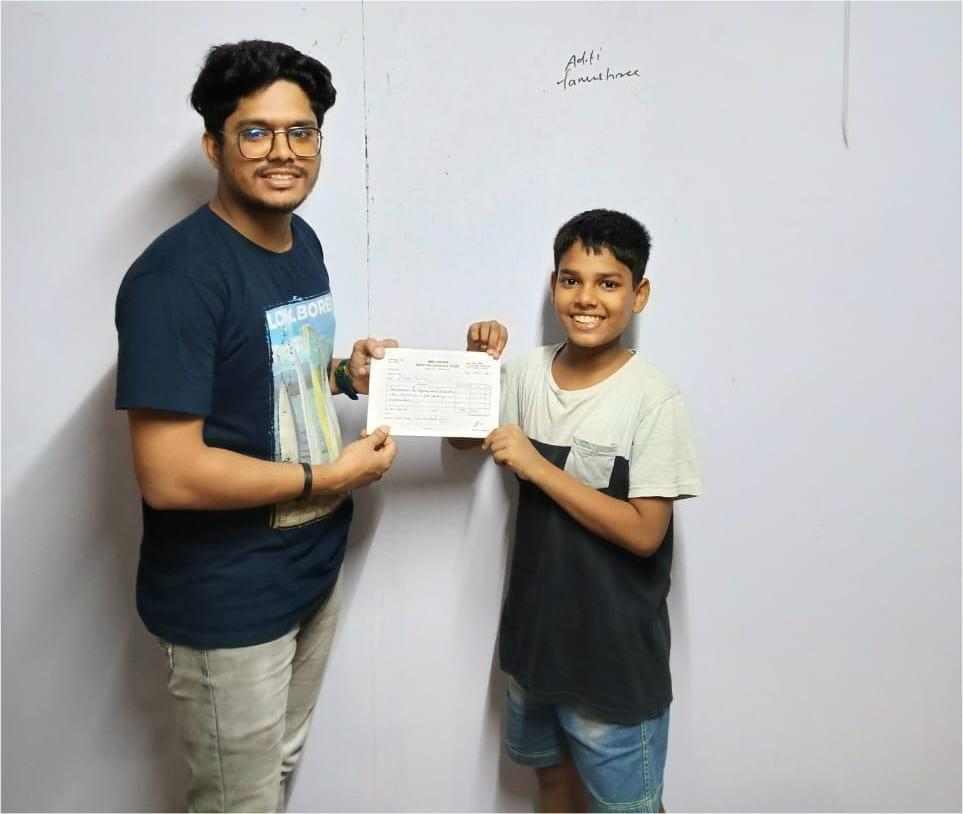 Picture of Ritesh with NCT family, offering him  a scholarship to continue his studies