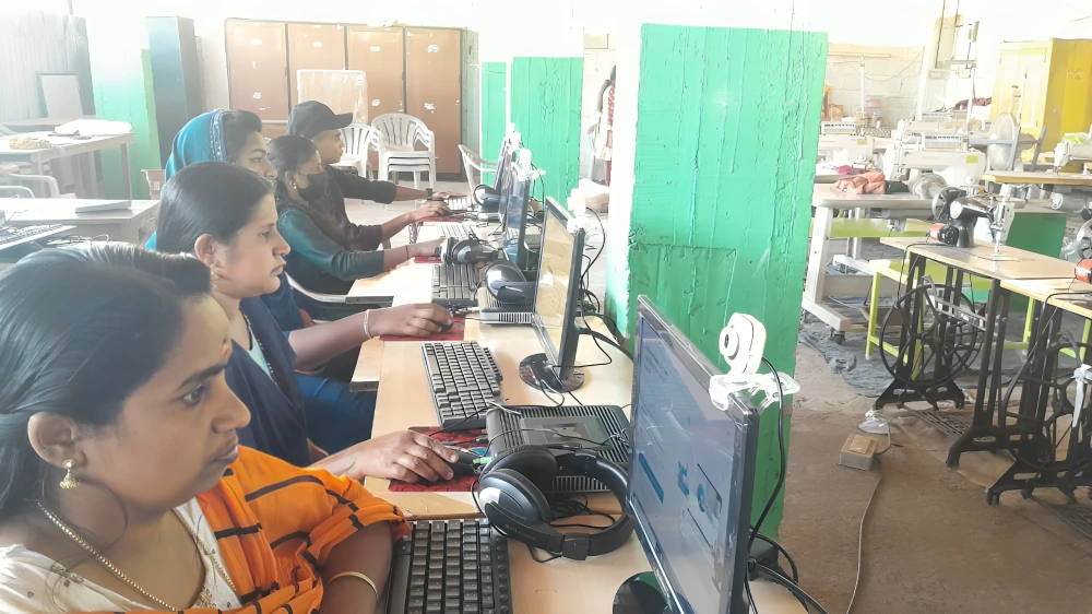 Tribal people learning computer skills at Swami Vivekananda Medical Mission, supported by Apni Pathshala